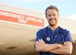 Emergency Room Doctor Standing in Front of Emergency Room