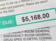 Close-up of a hospital bill showing a large payment due, representing challenges in managing patient balances for emergency and urgent care facilities.