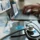 Healthcare professional analyzing billing metrics and charts on a laptop with digital overlays, symbolizing KPI tracking in emergency and urgent care billing.